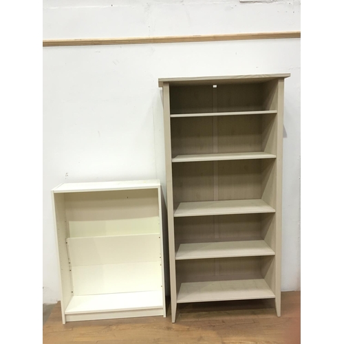 522 - A cream coloured open Bookcase, 6ft h x 3ft w x 1ft 4in deep, and another smaller