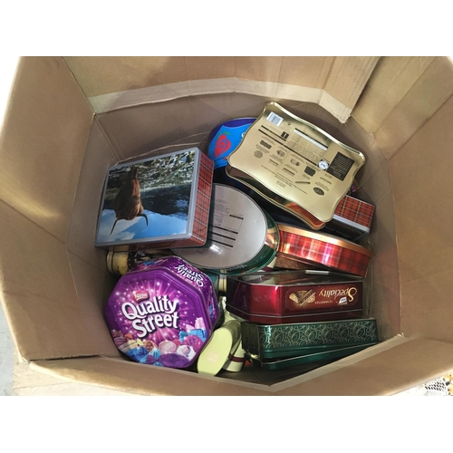 524 - A large quantity of Tins including biscuit tins and a box of material