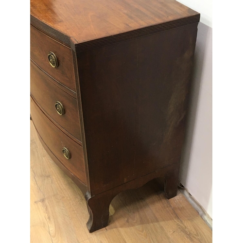 525 - A 19th Century mahogany Chest of three long drawers, flanked by reeded columns, 3ft 4in W x 3ft 2in ... 