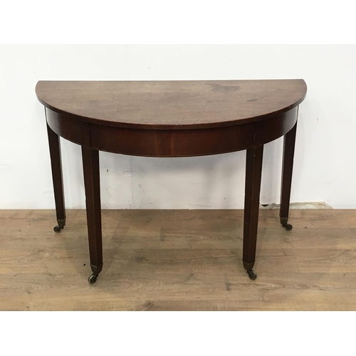 531 - A 19th Century mahogany demi-lune Side Table with squared supports and casters, 3ft 9in W