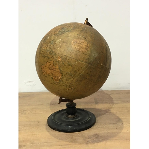 546 - A Philip's 19in Terrestrial Globe on stained wood stand A/F