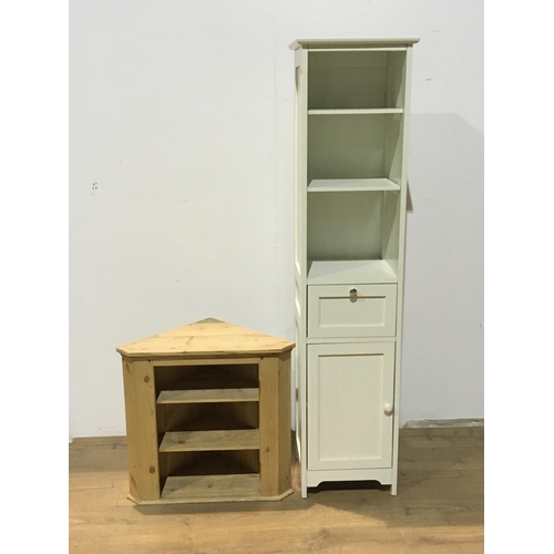 551 - A narrow white Cupboard with shelves, 5ft 5in 
h x 15 1/2 in W x 14in deep and a pine corner Shelf U... 