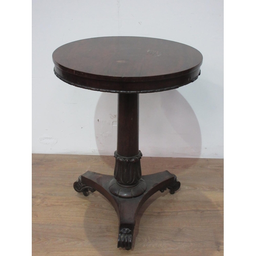 566A - A 9th Century rosewood Pillar table with carved and turned column and triform base, 1ft 9in diam