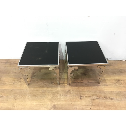 671 - A pair of modern square Coffee Tables with black glass tops inset within polished metal frames and s... 