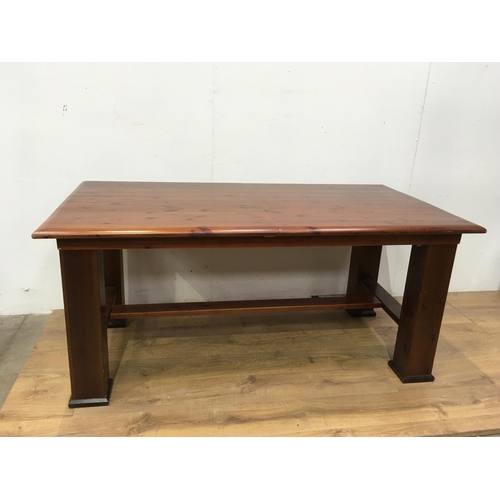 672 - A modern pine extending Dining Table on square cut supports 5ft 6in W x 2ft 6in H