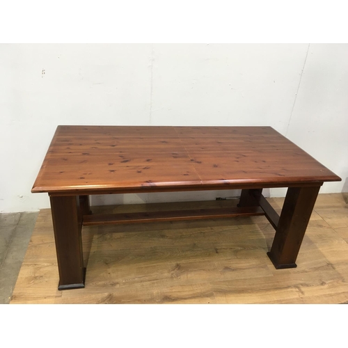 672 - A modern pine extending Dining Table on square cut supports 5ft 6in W x 2ft 6in H