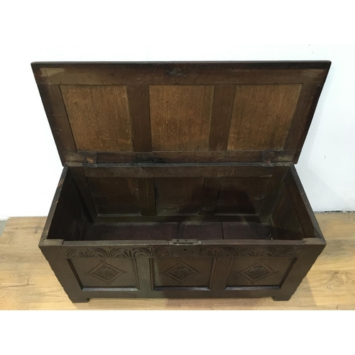 680 - A 17th Century oak Coffer with sunken three panel lid above three panel front with arcaded frieze 3f... 