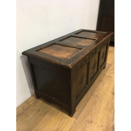 680 - A 17th Century oak Coffer with sunken three panel lid above three panel front with arcaded frieze 3f... 