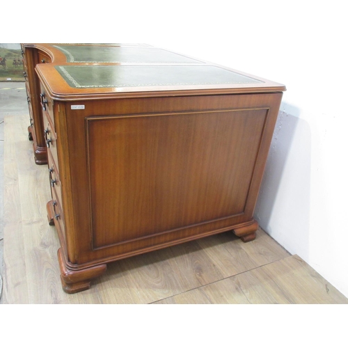 740 - A reproduction mahogany Pedestal Desk by Shaw of London with leather inset writing surface fitted ni... 