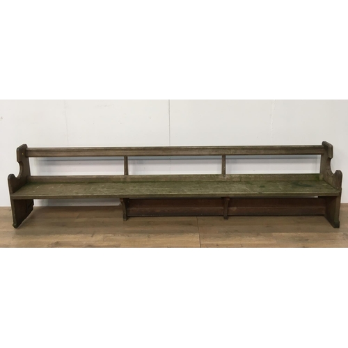 743 - A long antique pitch pine Church Pew 11ft 2in L x 2ft 8in H