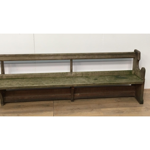 743 - A long antique pitch pine Church Pew 11ft 2in L x 2ft 8in H