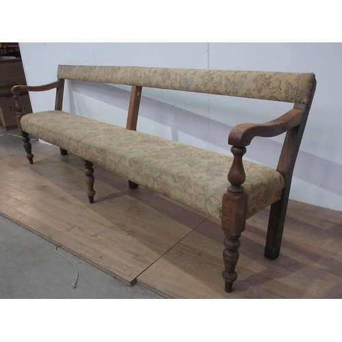 744 - A 19th Century pine Club Settle with upholstered back and seat mounted on turned front supports A/F ... 