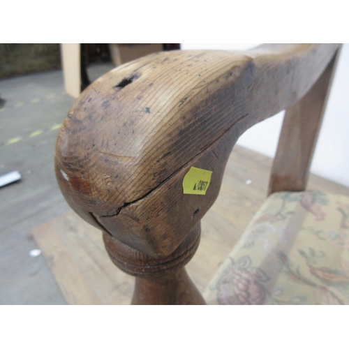 745 - A 19th Century pine Club Settle with upholstered back and seat mounted on turned front supports A/F ... 