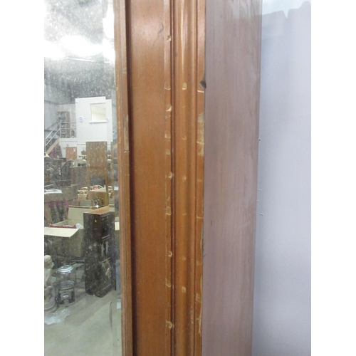 746 - A Victorian satin walnut triple Wardrobe missing base