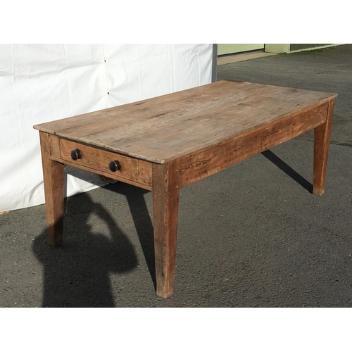 93 - A 19th Century pine Farmhouse Kitchen Table fitted end drawer mounted upon square cut tapering suppo... 