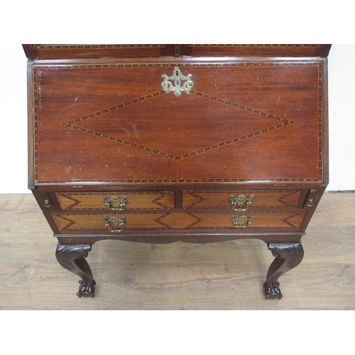 107 - An Edwardian mahogany Bureau Bookcase with boxwood and ebonised diamond stringing, the upper section... 