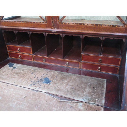 107 - An Edwardian mahogany Bureau Bookcase with boxwood and ebonised diamond stringing, the upper section... 