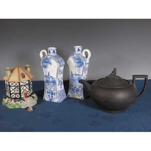 445 - A pair of delft Jugs of waisted form, a Victorian Pastille Burner in the form of a black and white c... 