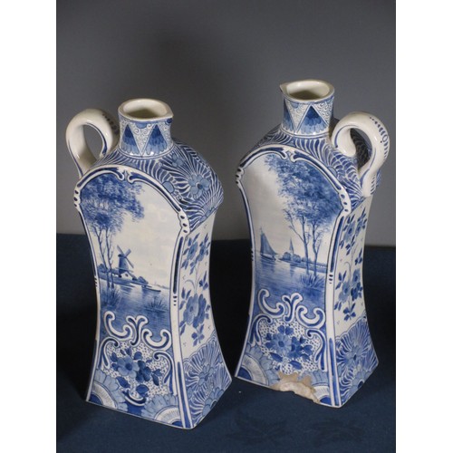 445 - A pair of delft Jugs of waisted form, a Victorian Pastille Burner in the form of a black and white c... 