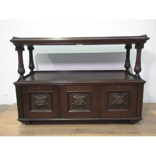 446 - A 19th Century oak Buffet with leafage carved corinthian column supports above base fitted three dee... 