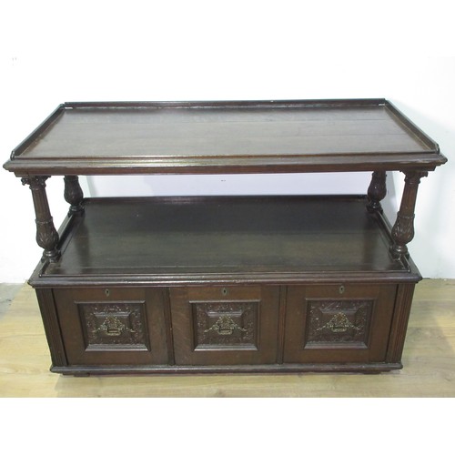 446 - A 19th Century oak Buffet with leafage carved corinthian column supports above base fitted three dee... 