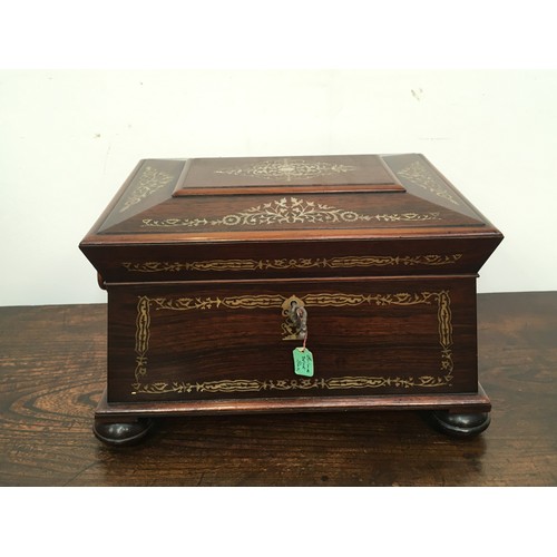 278 - A Regency rosewood  sarcophagus shaped Workbox with inlaid mother of pearl decoration, interior fitt... 