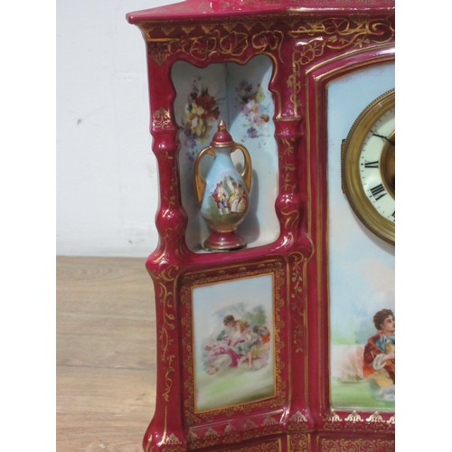 535 - A Continental pottery Mantel Clock, with transfer printed designs after Boucher of lovers in landsca... 