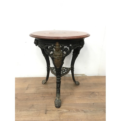 563 - A Victorian Britannia circular Pub Table with pierced and cast base, 2ft diam