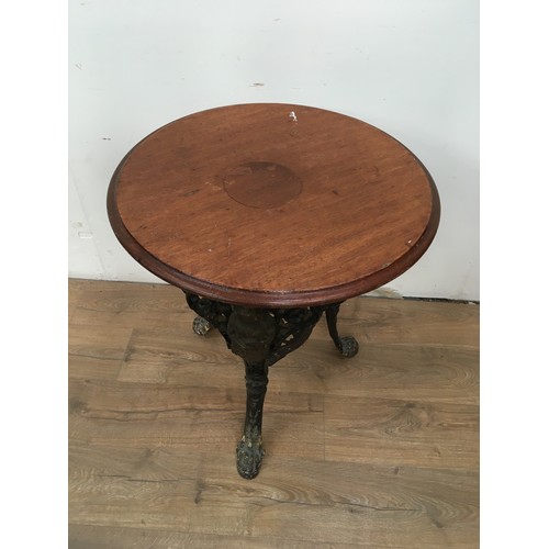 563 - A Victorian Britannia circular Pub Table with pierced and cast base, 2ft diam