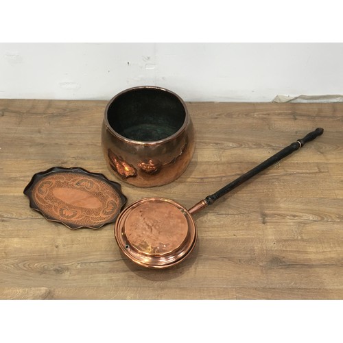 363 - An antique copper Cauldron 1ft 2in D, an Art Noveau oval copper Tray 1ft 4in W and a Warming Pan