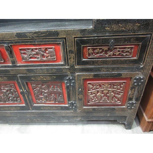 752 - An antique Chinese chinoisserie black lacquered Cabinet with beast and fruiting grape pierced frieze... 