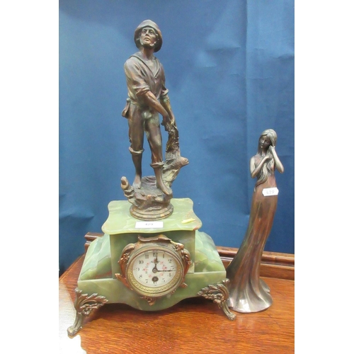 429 - An onyx and gilt metal Mantel Clock with figural surmount of a fisherman 1ft 8 1/2in H and a Figure ... 