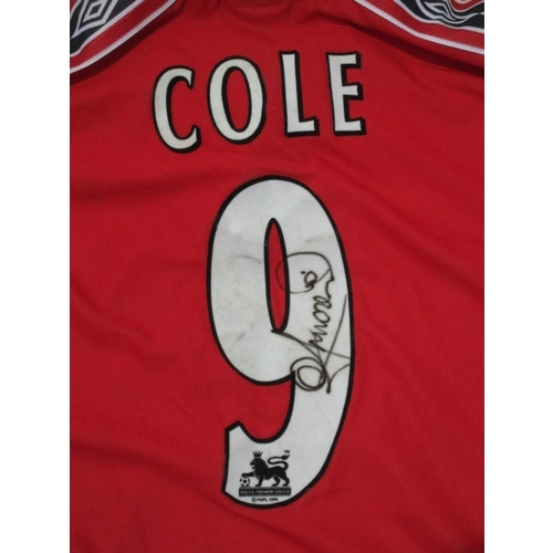 118 - A Manchester United Football Shirt signed by Cole