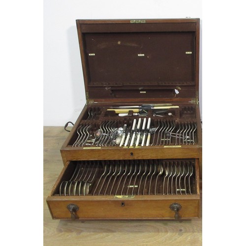 393 - An oak Canteen of Cutlery stamped Goldsmiths and Silversmiths Company Ltd 1ft 8in W