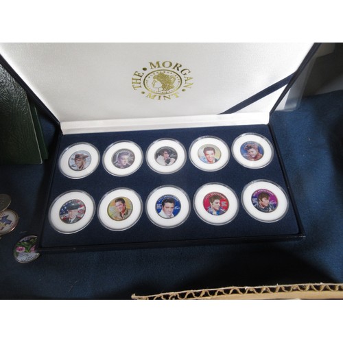 82 - A collection of mainly British & US modern commemorative Coins, to include two Elvis 