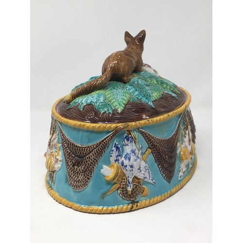 491 - A blue glazed oval Game Tureen in the George Jones style with handle in the form of a Fox with chick... 