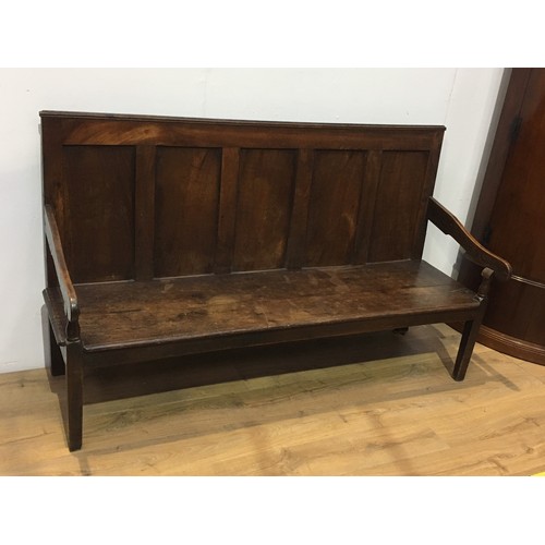 771 - An antique oak and elm Settle with plain five panel back, shaped arms on square legs, 5ft 10in.