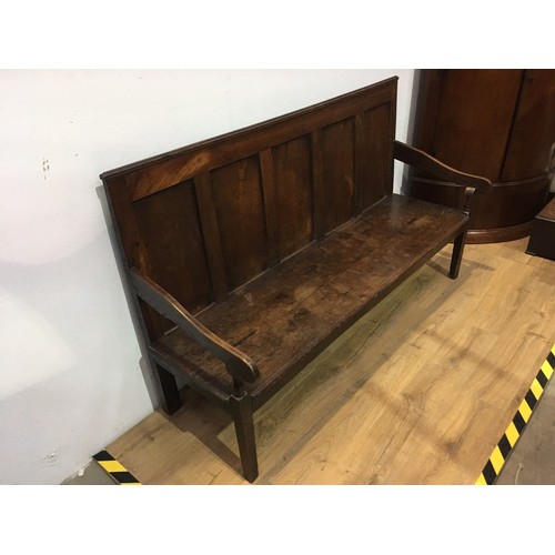 771 - An antique oak and elm Settle with plain five panel back, shaped arms on square legs, 5ft 10in.