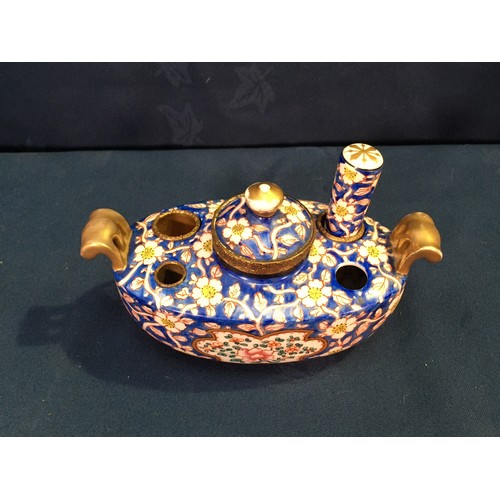 502 - A 19th Century Porcelain Inkstand and Seal decorated with daisies on blue ground with gilt metal mou... 