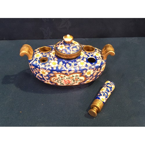 502 - A 19th Century Porcelain Inkstand and Seal decorated with daisies on blue ground with gilt metal mou... 