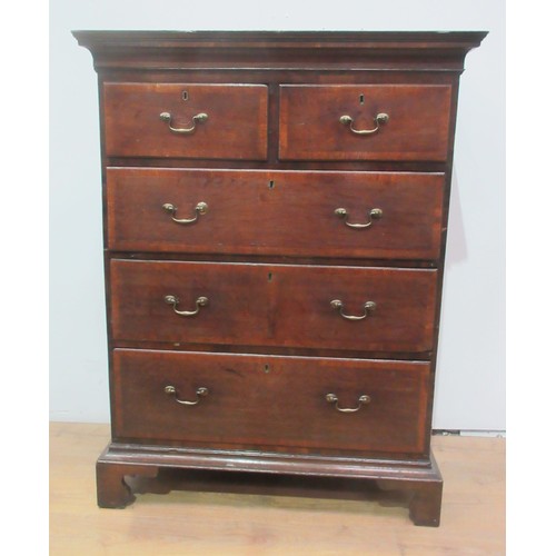 780 - An 18th Century tall Chest of two short and three long drawers with mahogany crossbanding