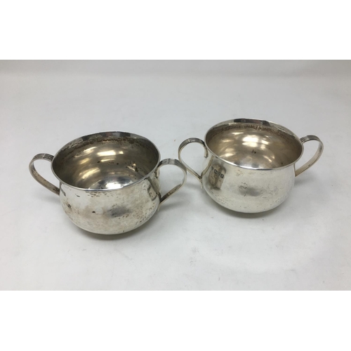 121 - A pair of George V silver two-handled bellied Bowls, Chester 1916, makers: GN & RH, 356 gms.