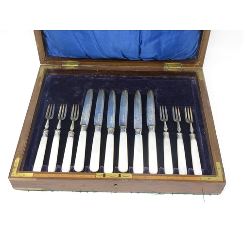 127 - Six Edward VII Dessert Knives and Forks with silver blades and mother of pearl hafts, Sheffield 1909... 