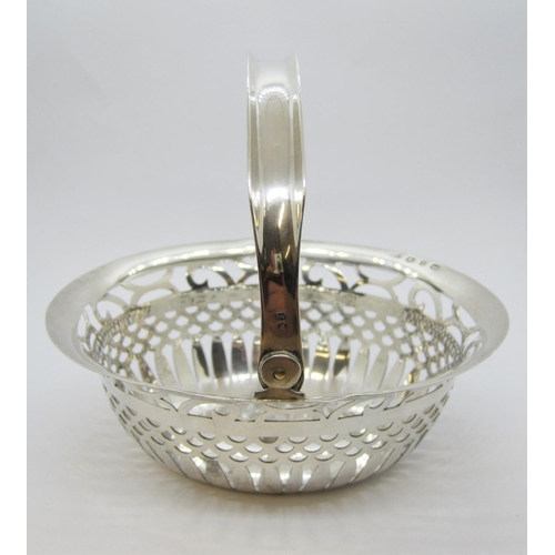 130 - A Victorian silver pierced oval Basket with swing handle, Birmingham 1899.