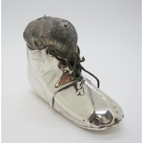 134 - A George V silver Pin Cushion in the form of a boot, Birmingham 1911, maker: Levi & Soloman.