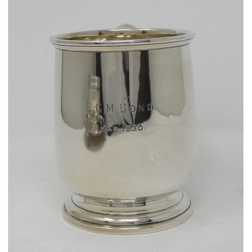 144 - A George V silver heavy Mug with inscription, Birmingham 1930, maker Adie Bros, 400 gms.