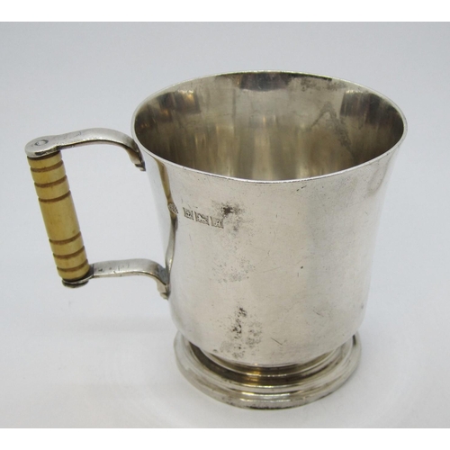 168 - A George VI silver Christening Mug of waisted form on pedestal base, turned bone handle, Birmingham ... 