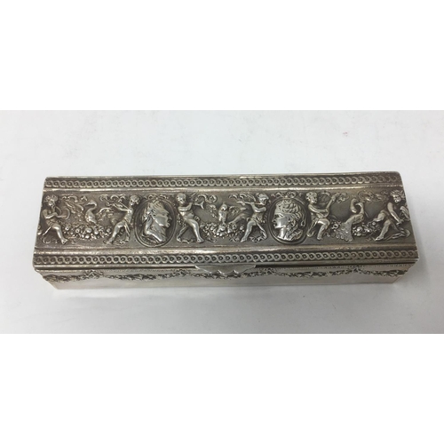 180 - A Continental Silver Box with hinged lid embossed dancing cherubs and oval busts, the sides with flo... 