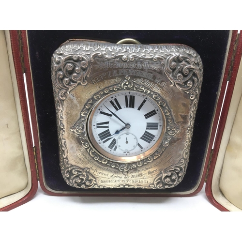 181 - A Victorian silver mounted Travelling Clock Case with scroll embossing and presentation inscription,... 