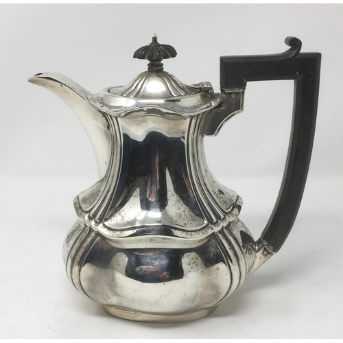 183 - A George V silver Hot Water Jug of lobed form, Birmingam 1920, 542g